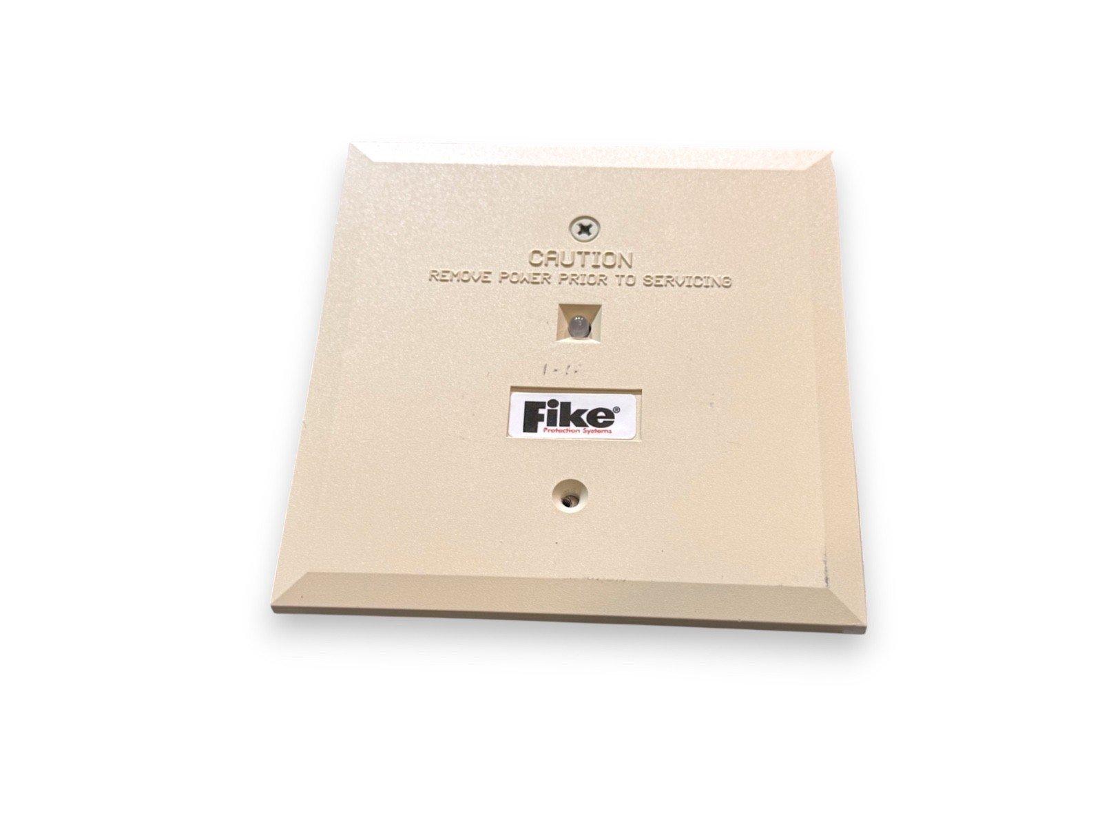Fike fire alarm control panel cover with caution label, beige metal housing for protection systems