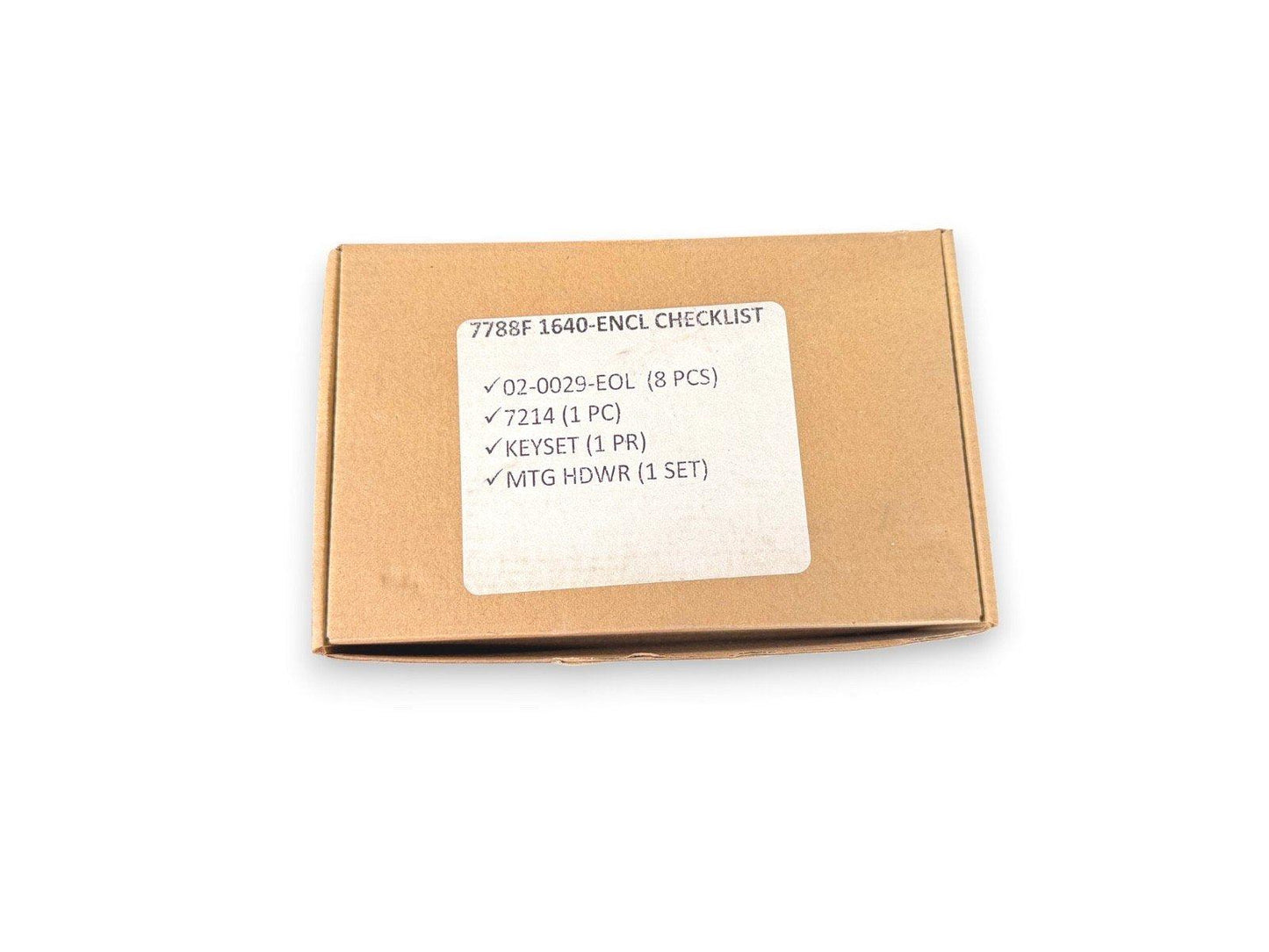 Fire alarm equipment parts box with checklist label, including keyset and hardware for fire safety systems