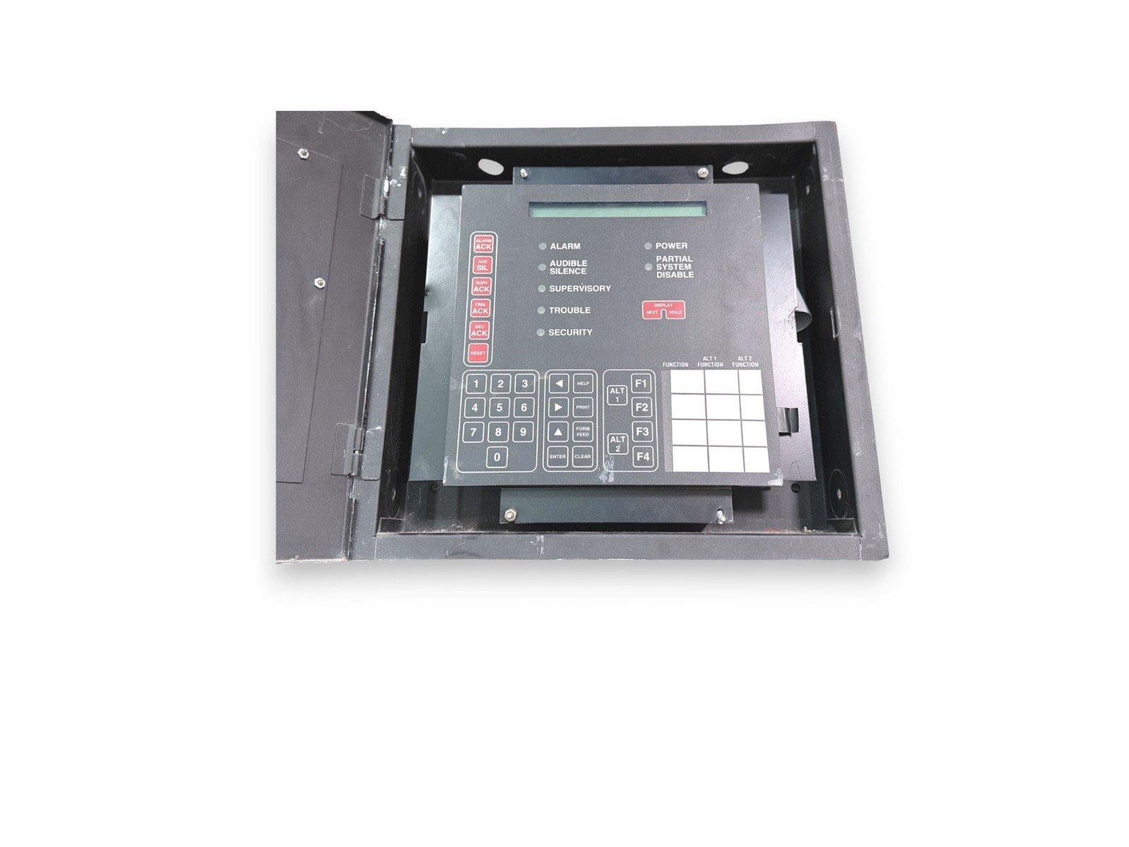 Fire alarm control panel with keypad, status indicators, and open enclosure for installation