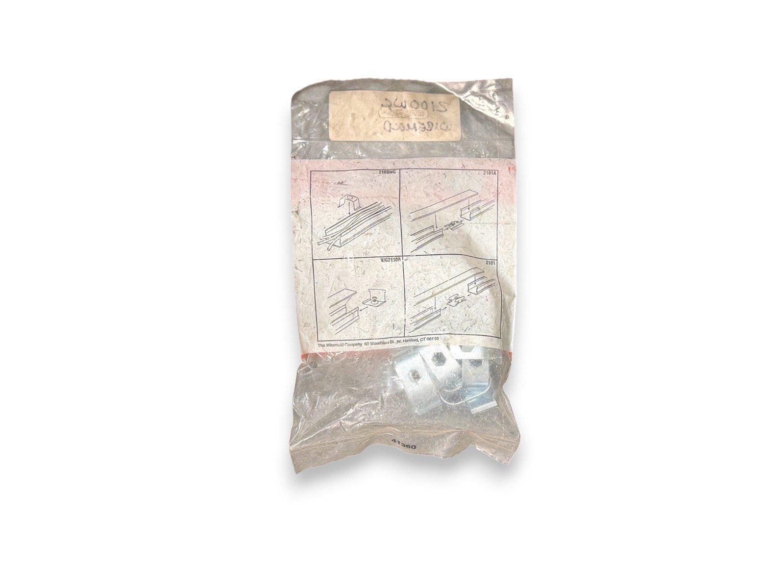 Used fire alarm mounting brackets in original packaging with installation diagrams