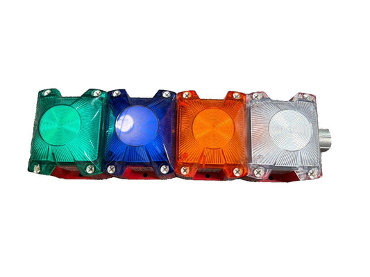Four-color fire alarm strobe light with green, blue, amber, and white lenses for emergency signaling