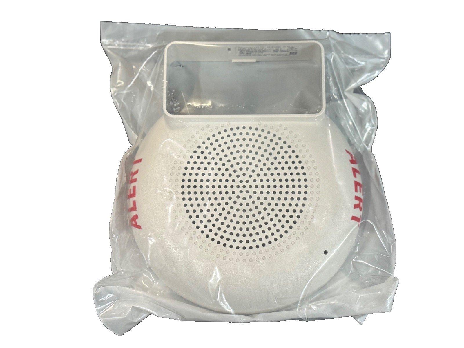 White fire alarm speaker with 'ALERT' text, sealed in plastic packaging for safety equipment