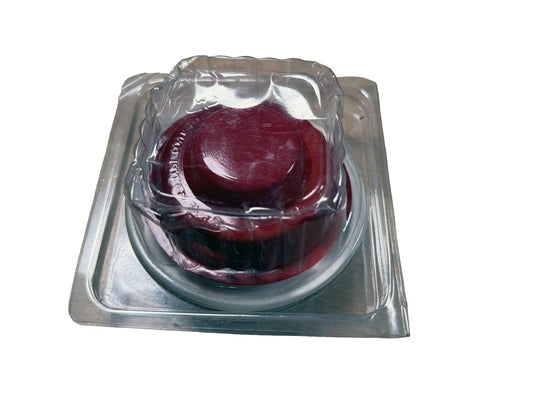 Red fire alarm pull station cover in clear plastic packaging