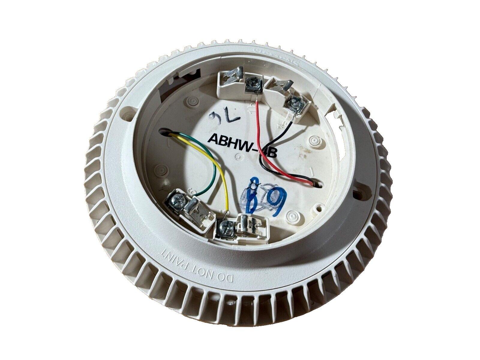 White fire alarm detector base with wiring terminals and model ABHW-4B, ready for installation