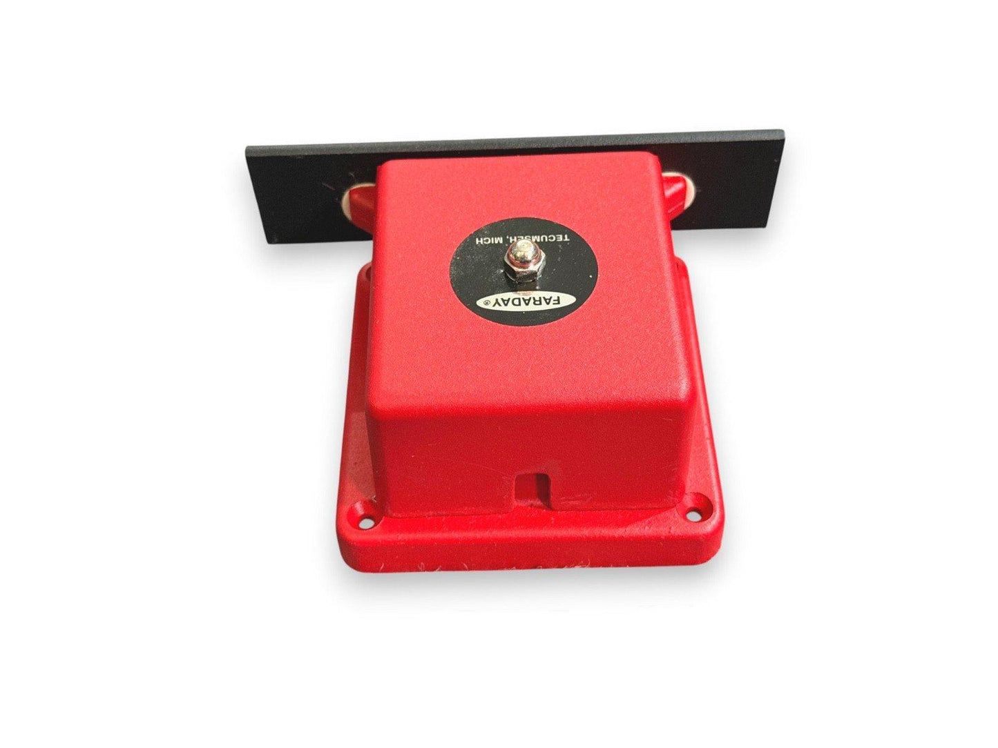 Red Faraday fire alarm pull station with black mounting plate, used in commercial safety systems