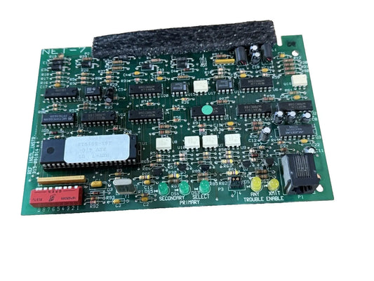 Siemens NET-7 Fire Alarm Communications Interface Card featuring a green circuit board with various electronic components.