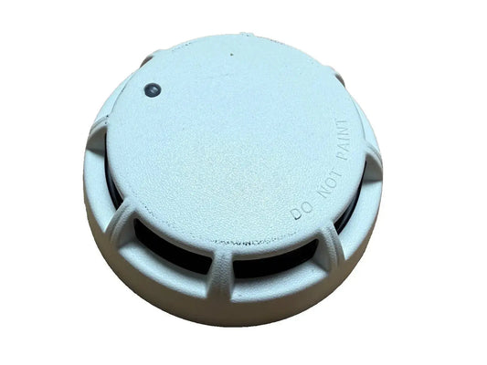 White Potter PAD200-PD Fire Alarm Smoke Detector with a rounded design and warning label, ideal for safety installations.
