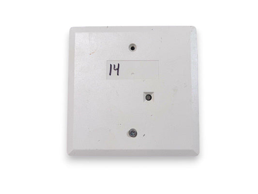 White fire alarm pull station with handwritten label 14, used fire safety equipment