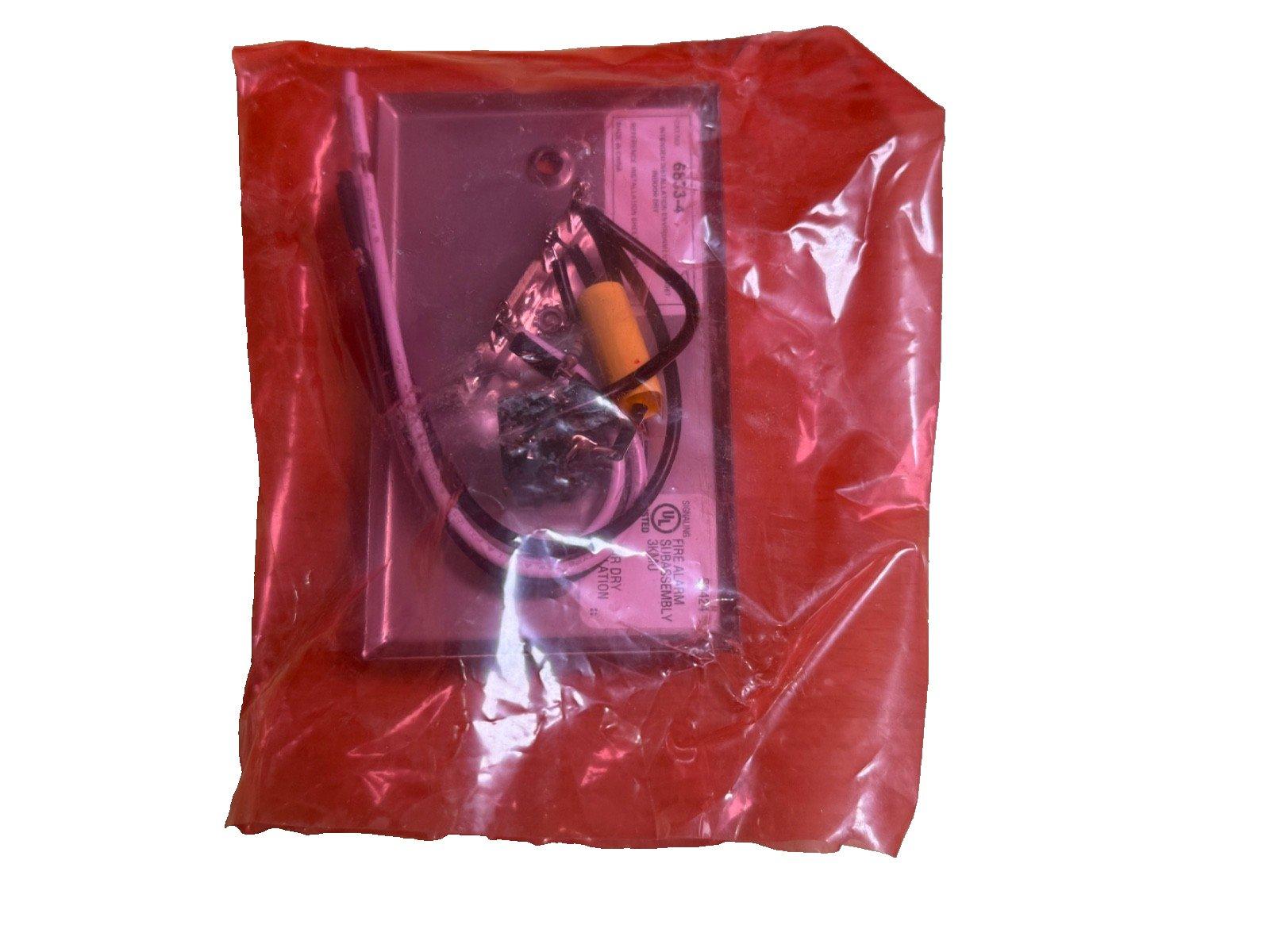 Fire alarm subassembly in red packaging, includes wiring and UL-listed components for safety systems