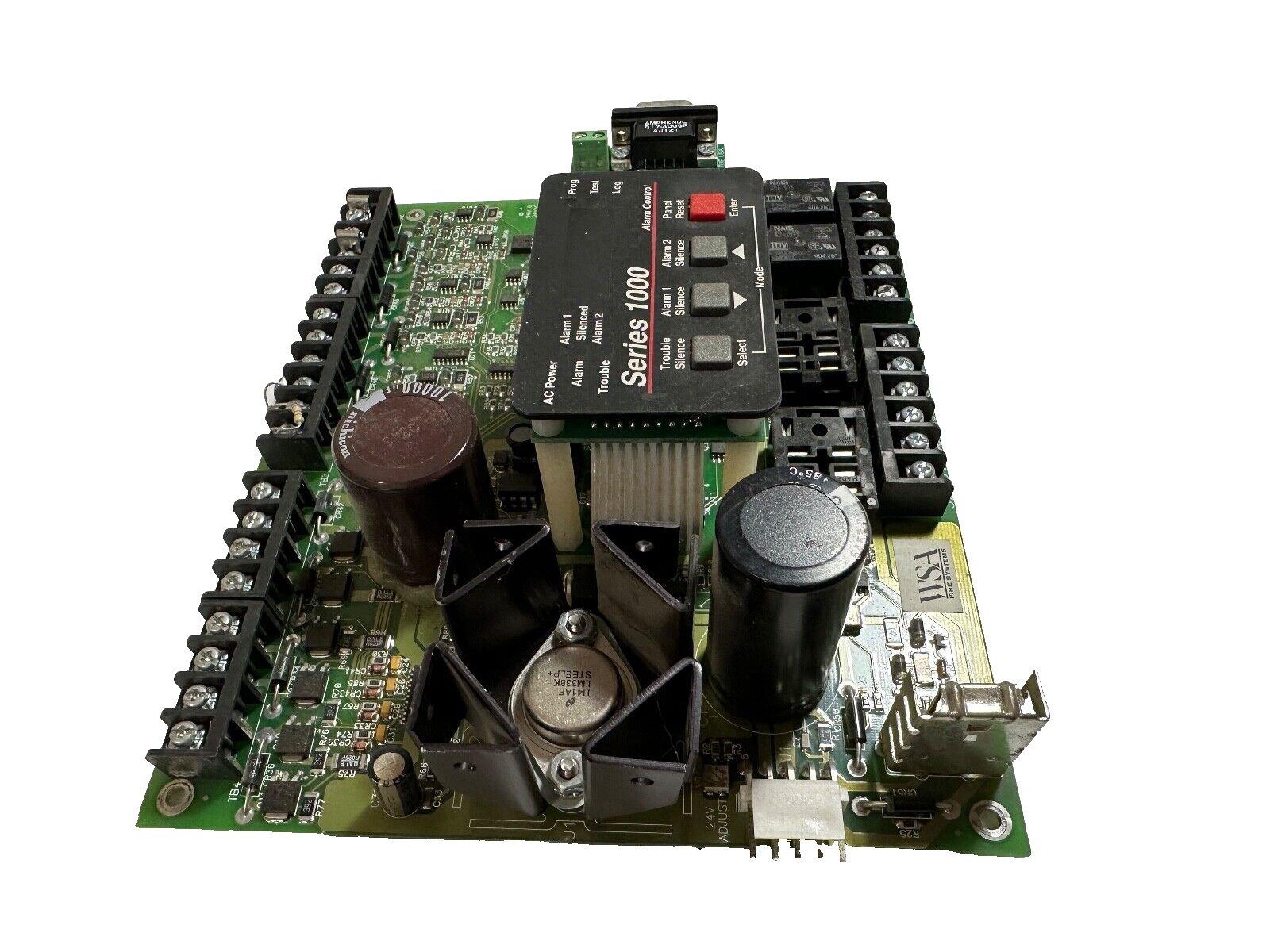 Series 1000 fire alarm control panel circuit board with terminal blocks and capacitors