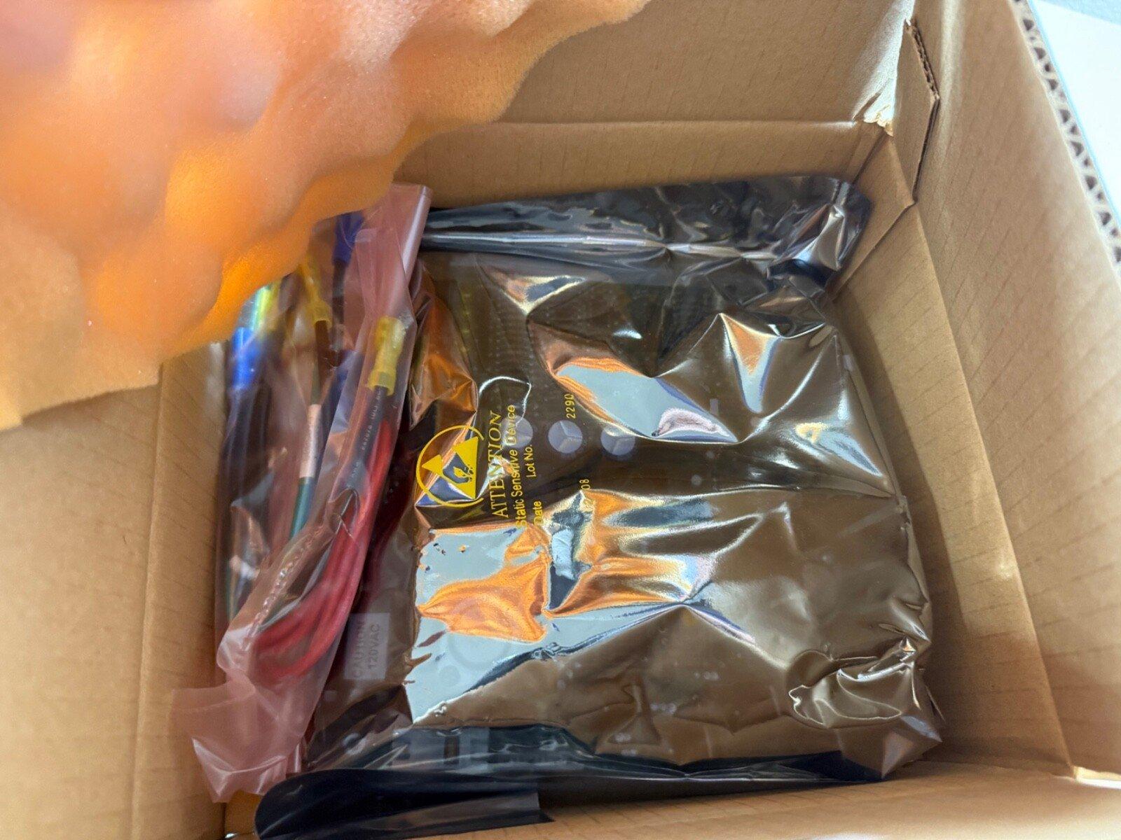 Fire alarm equipment in anti-static bag inside shipping box with foam padding