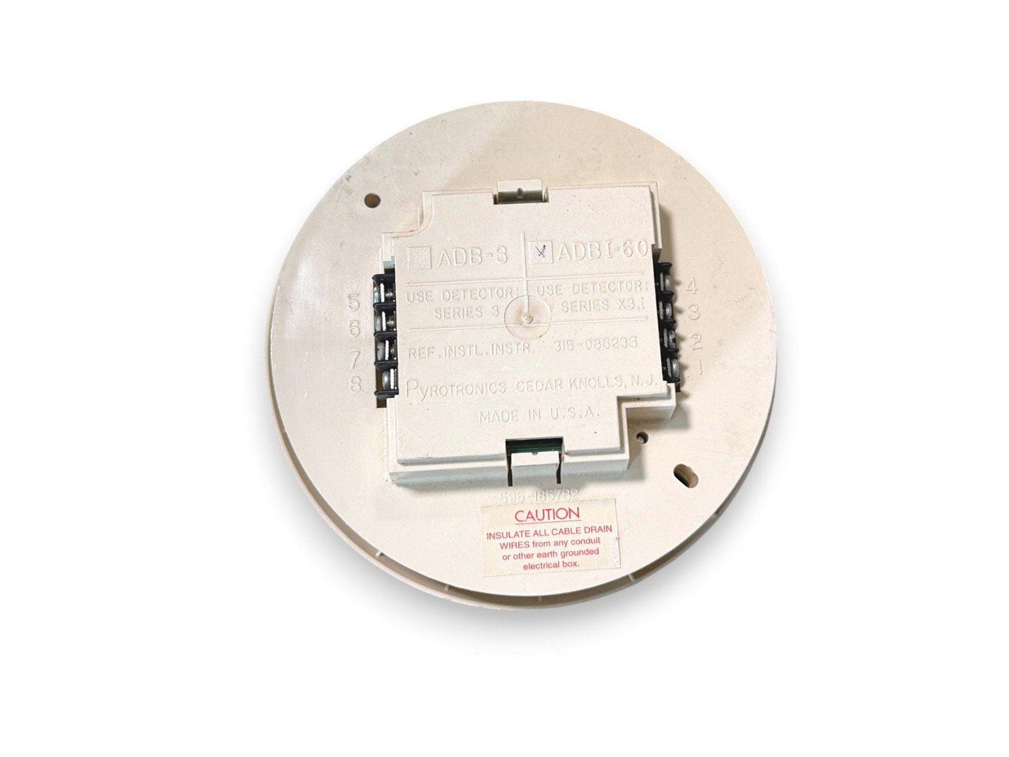 Pyrotronics ADBI-60 fire alarm detector base, Series X3.1, made in USA with wiring terminals and caution label