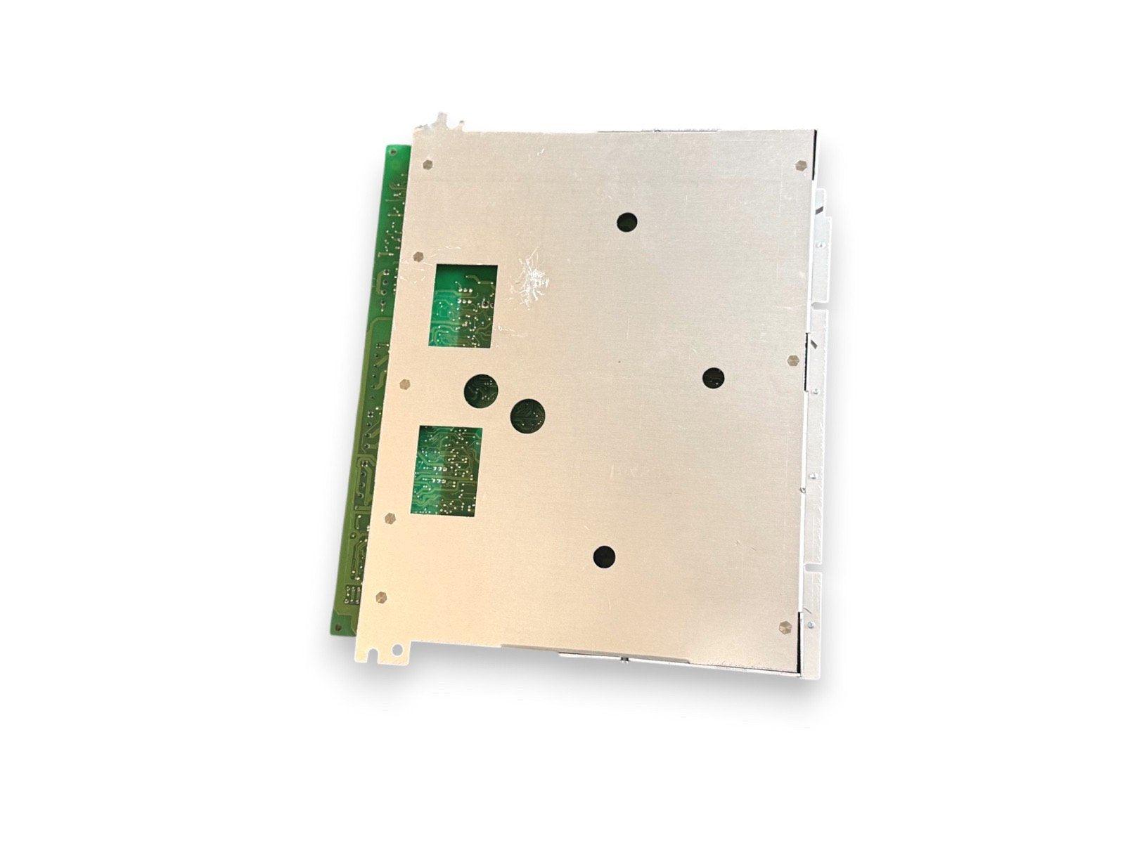 Fire alarm control panel circuit board with green PCB and mounting holes