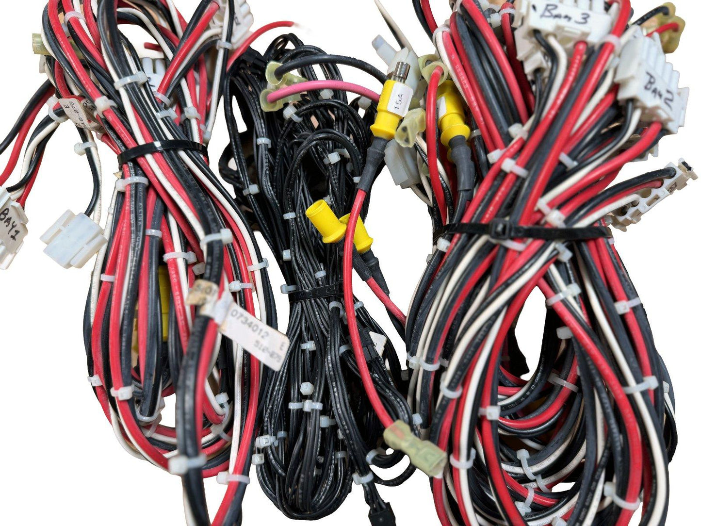 Fire alarm wiring harness with red, black, white cables, connectors, and labels for system installation