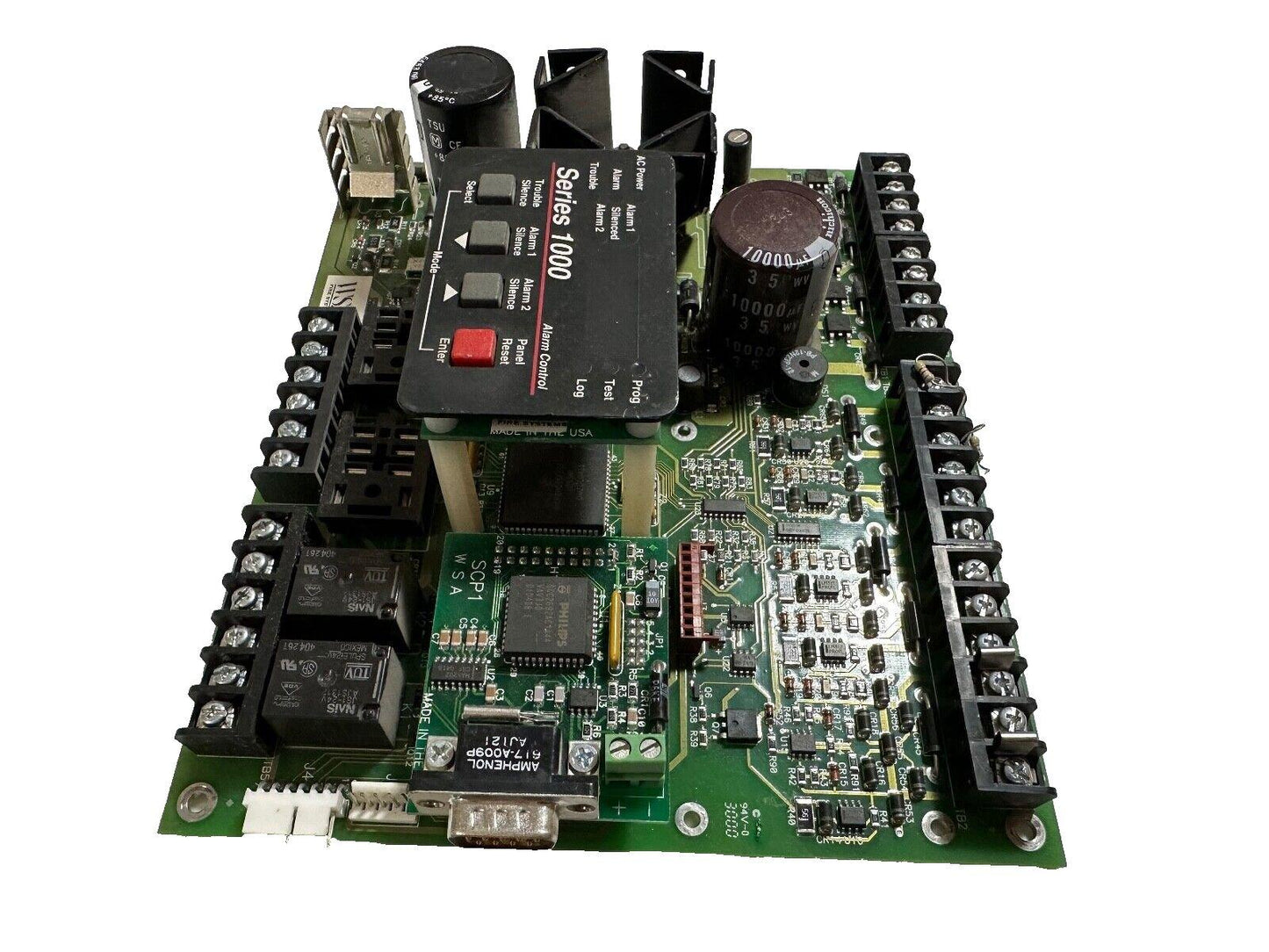 Series 1000 fire alarm control panel circuit board with terminal blocks and capacitors