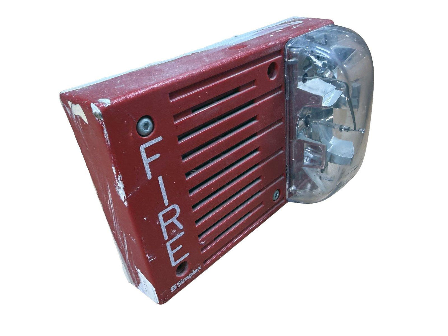 Red Simplex fire alarm horn strobe with clear lens and visible wiring, used fire safety equipment