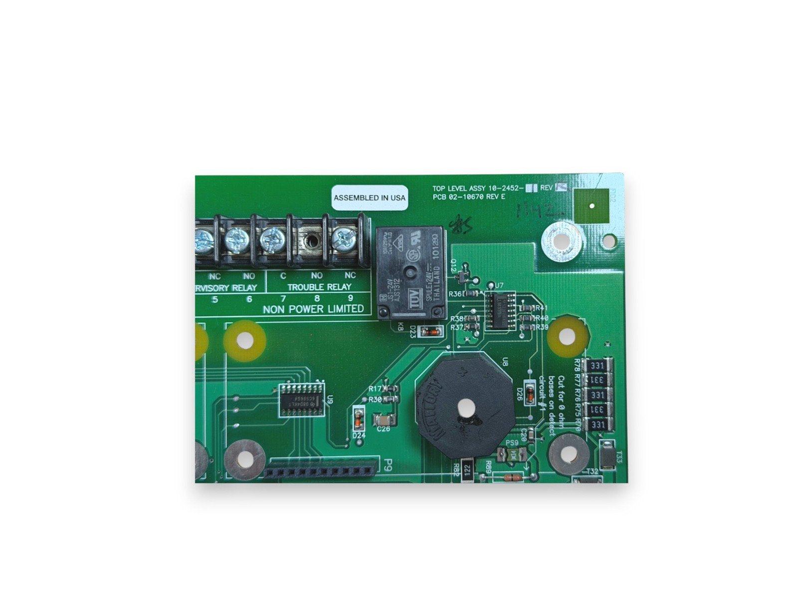 Fire alarm control panel circuit board with relays and components, assembled in USA