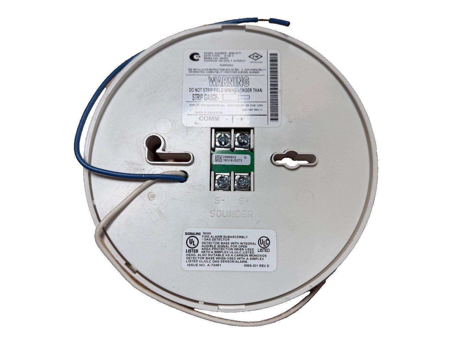 Fire alarm detector base with wiring terminals and UL listed label for gas or CO detection