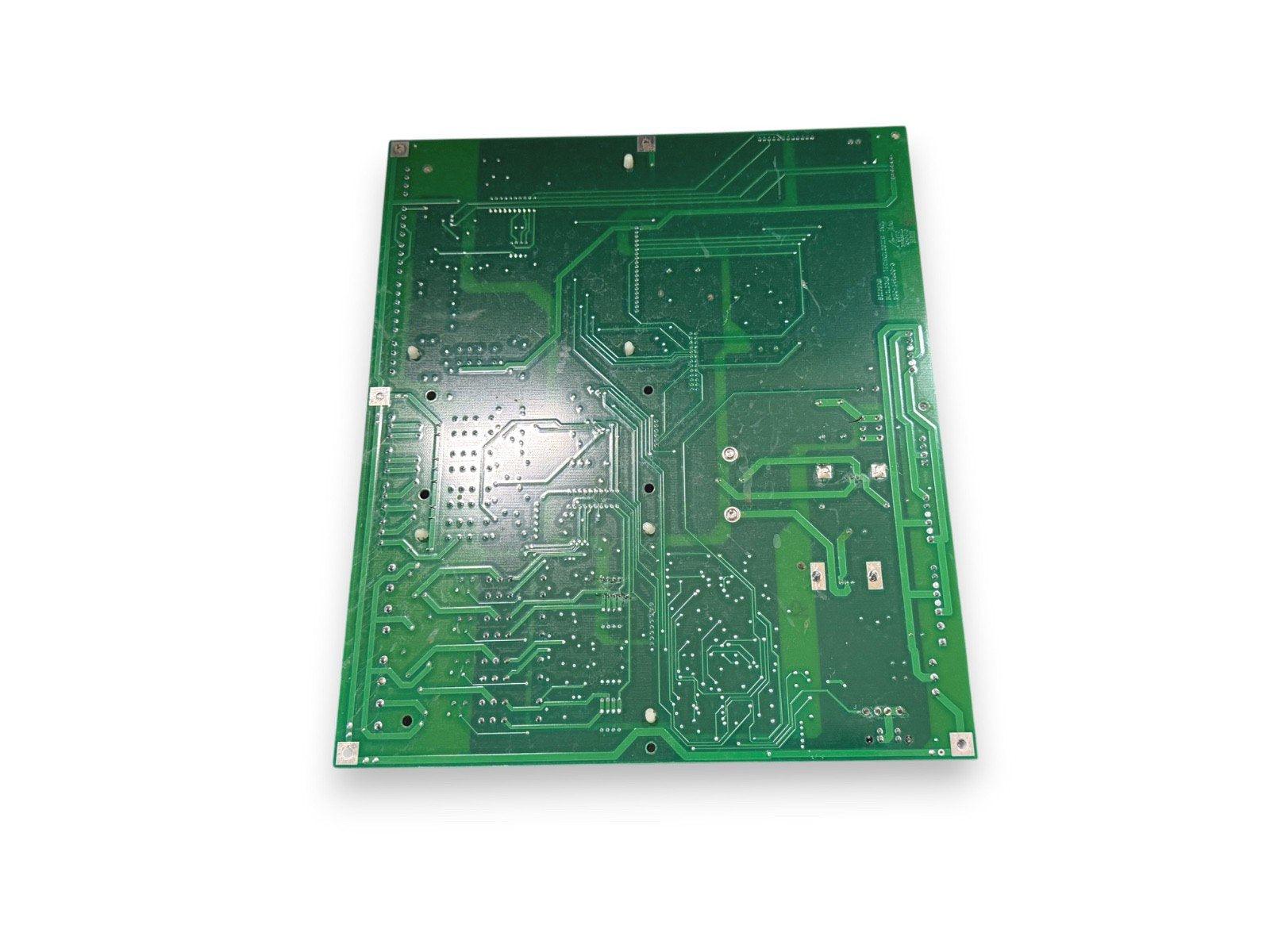 Green fire alarm control panel circuit board with solder points and traces