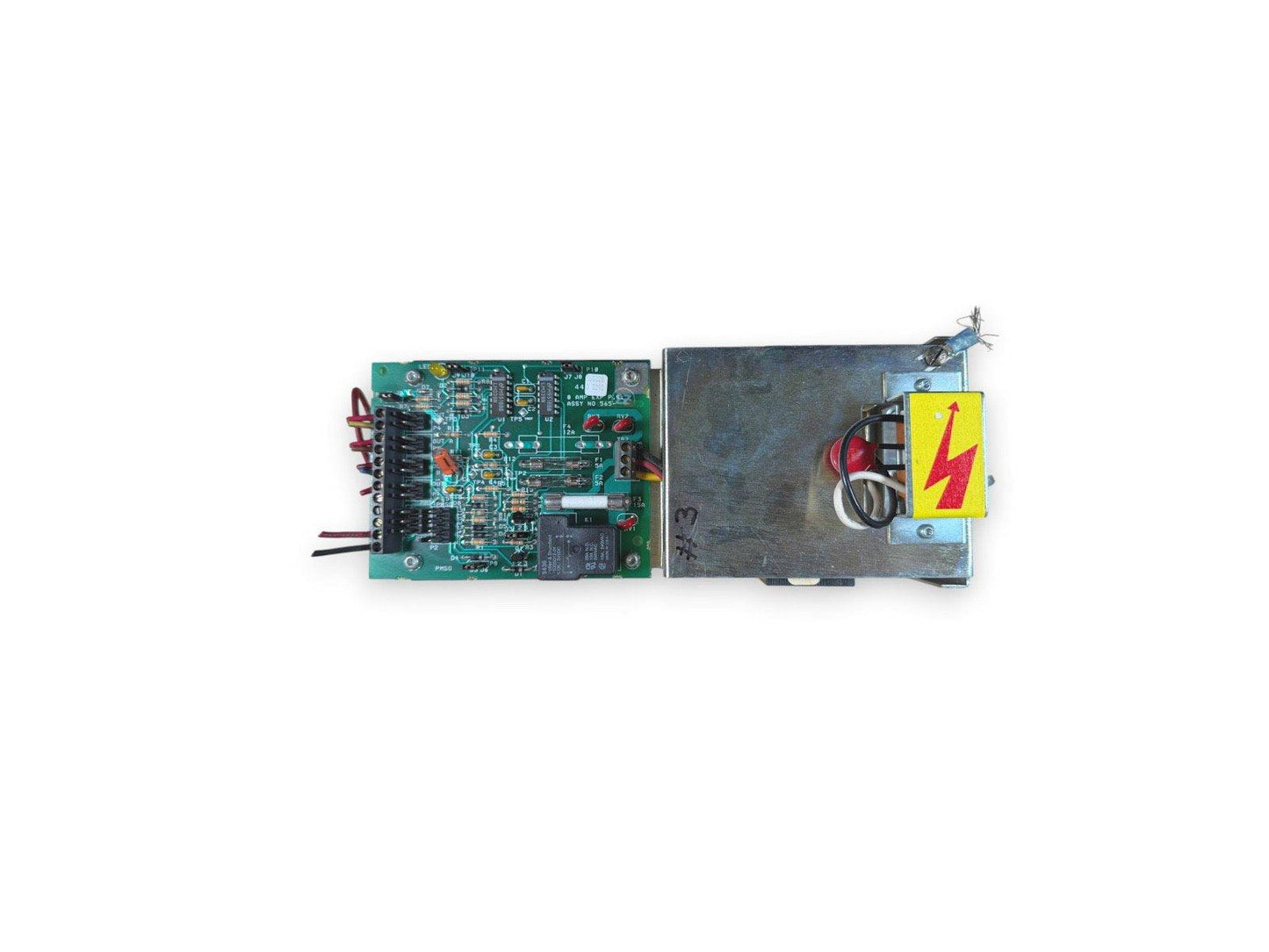 Fire alarm control panel circuit board with power supply and warning label