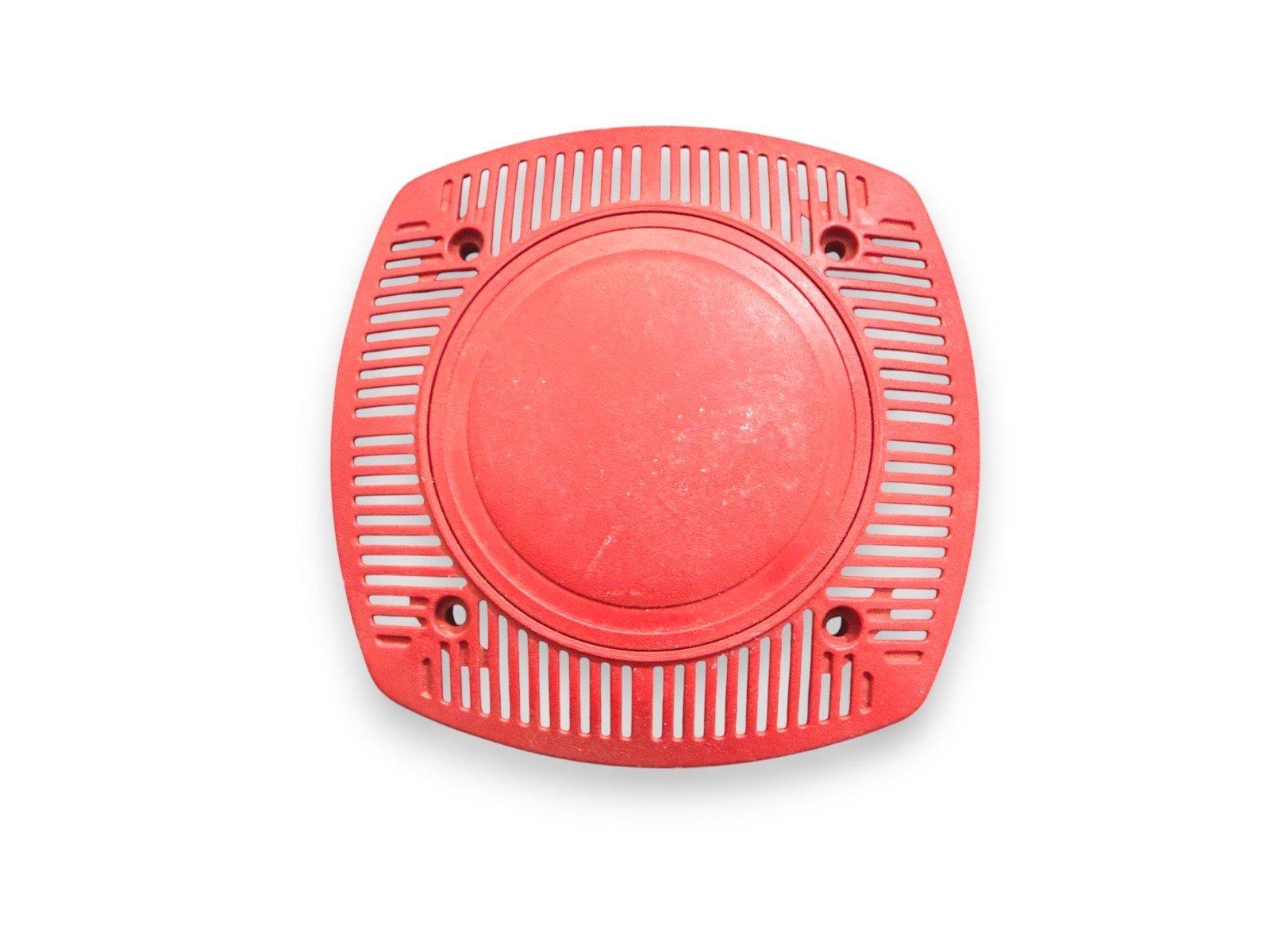 Red fire alarm speaker cover with slotted design for emergency alert systems
