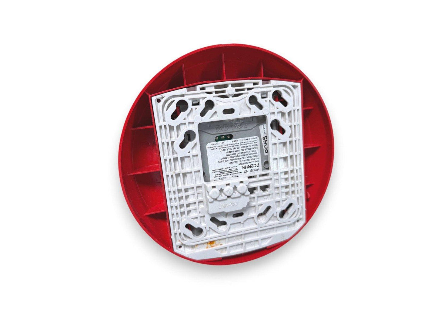 Red fire alarm horn strobe with white mounting base, model PC2RHK, for commercial fire safety systems