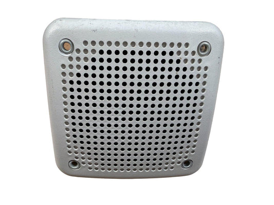 Silver fire alarm speaker with perforated grille and mounting holes