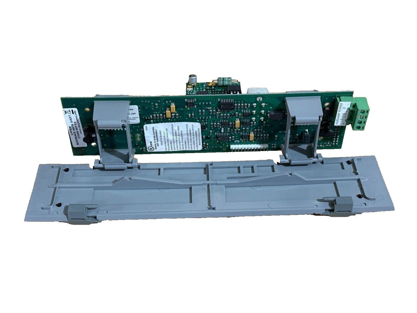 Fire alarm control panel circuit board with auxiliary power terminals and mounting bracket