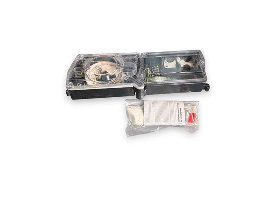 Fire alarm strobe light with clear cover, internal wiring, and instruction packet for safety systems