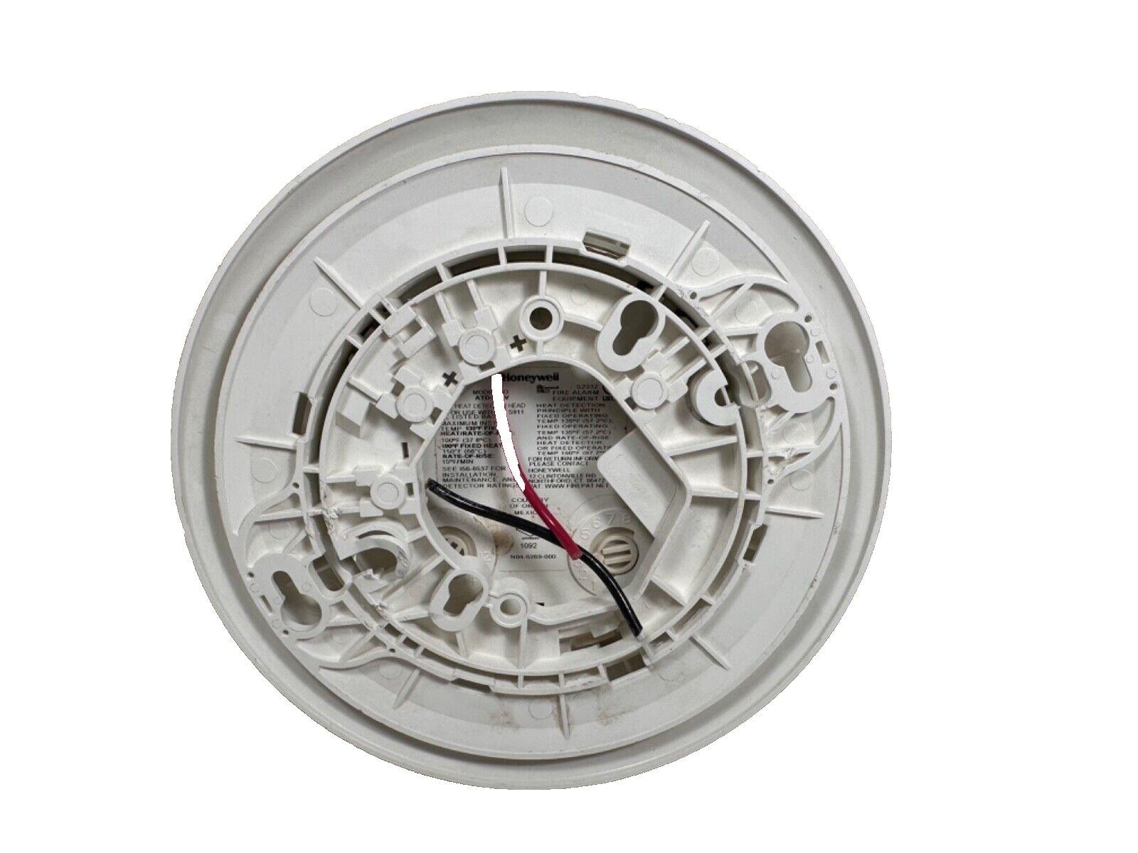 Honeywell fire alarm heat detector with wiring, white circular base for commercial or residential use