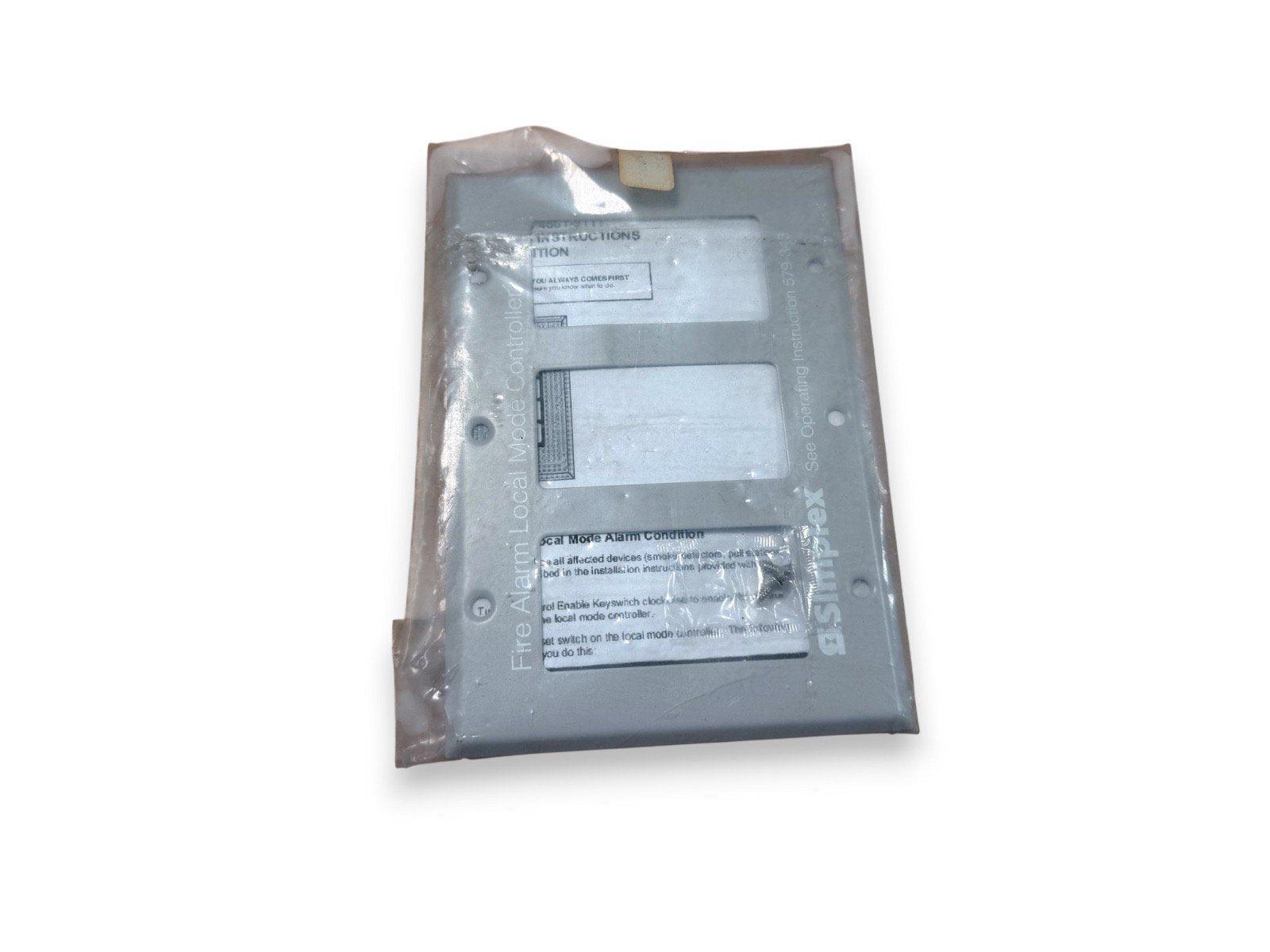 SimpliFire fire alarm local mode controller panel in protective packaging, for commercial fire safety systems