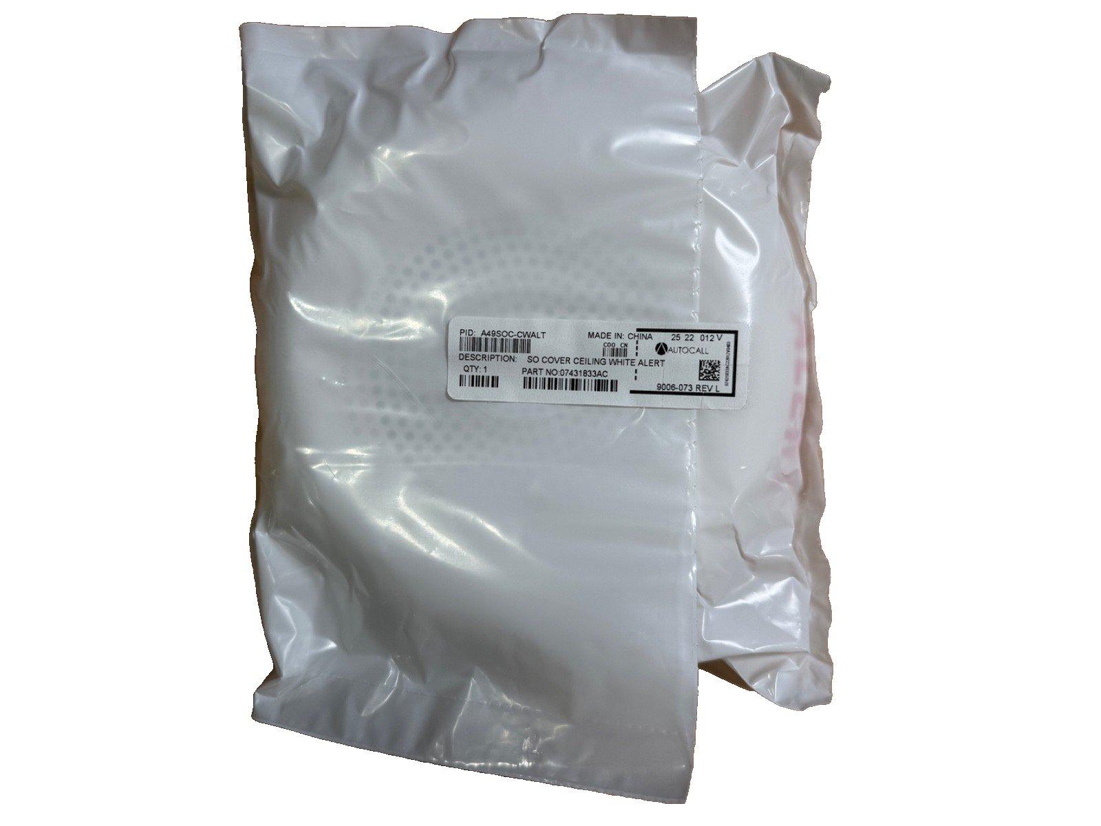 White ceiling cover for fire alarm alert, packaged in clear plastic with Autocall label