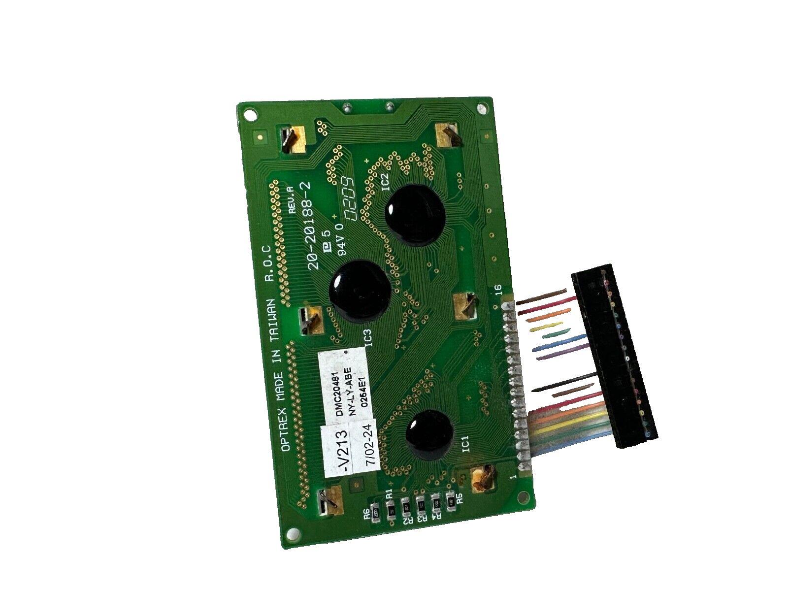 Green fire alarm control panel circuit board with connectors and labeled components for fire safety systems