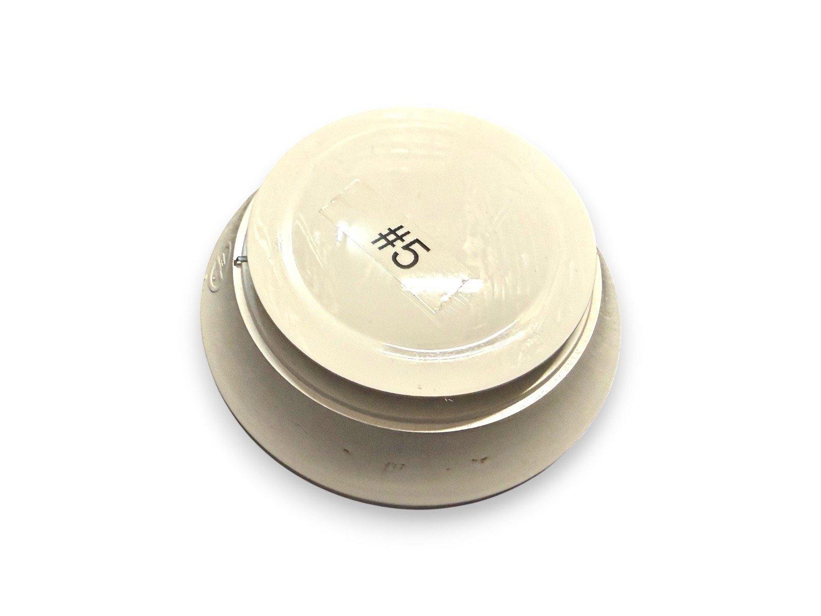 Beige fire alarm detector with #5 label, used fire safety equipment