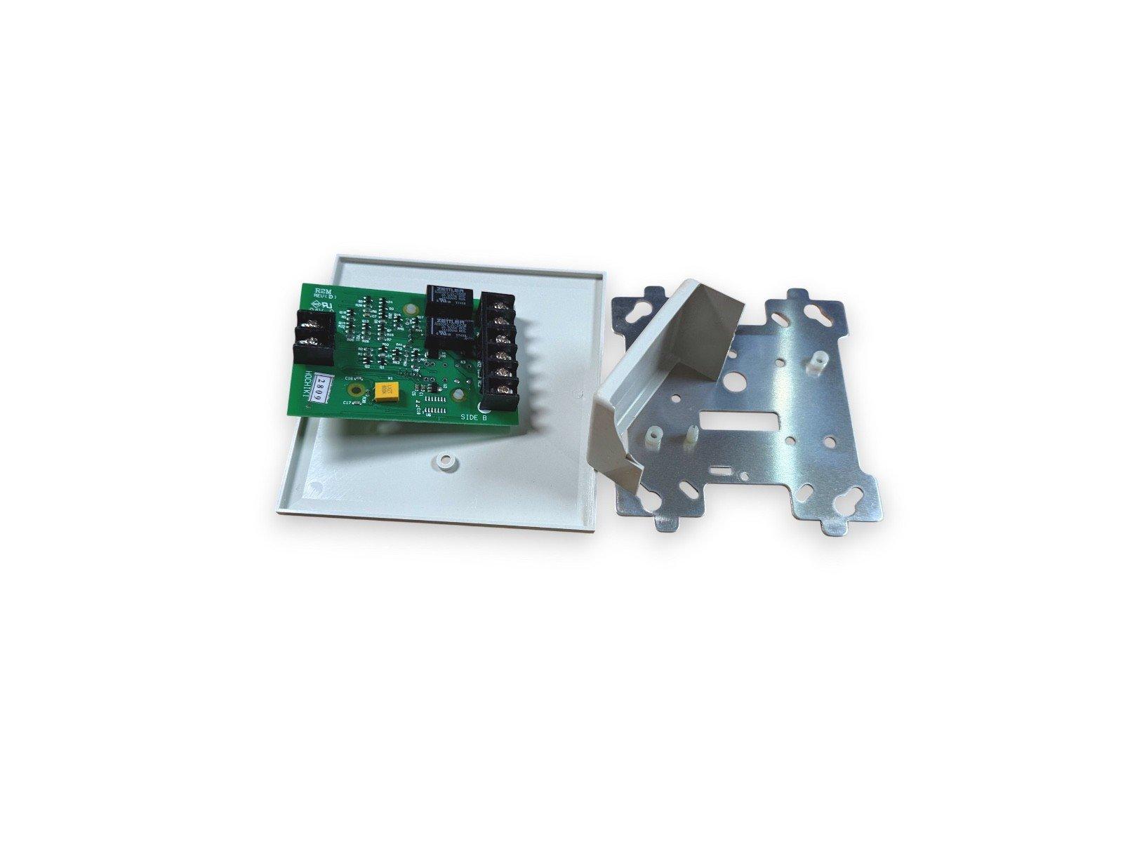 Fire alarm control module with circuit board and metal mounting bracket for fire safety systems