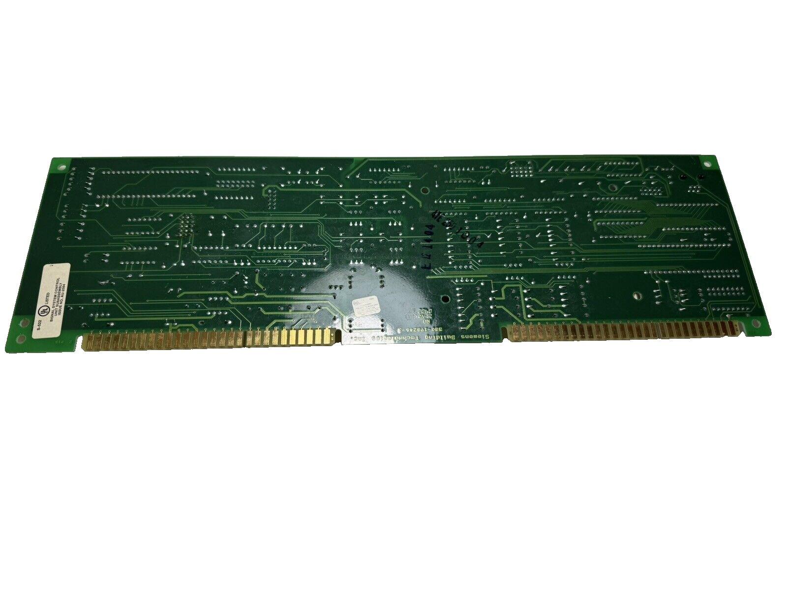 Siemens fire alarm control panel circuit board with gold connectors and UL listing label