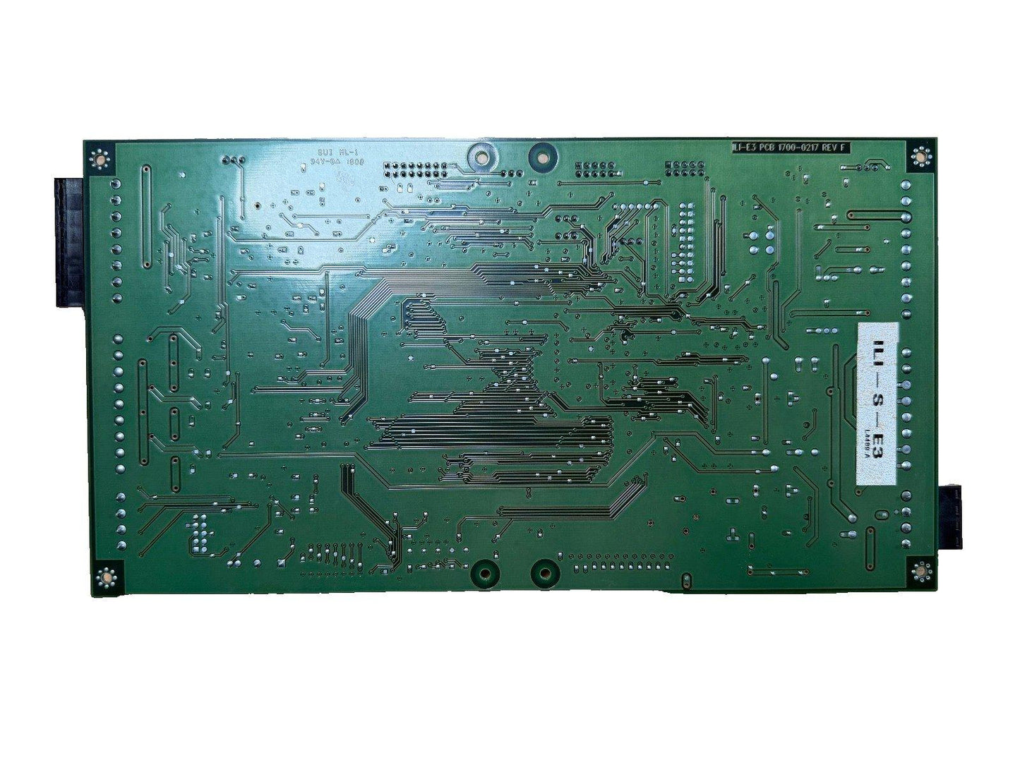 Green fire alarm control panel circuit board with PCB traces and connectors, model LI-E3