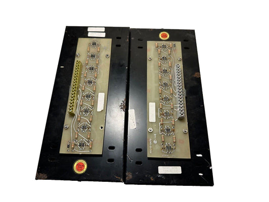 Used fire alarm control panels with circuit boards, resistors, and UL labels for commercial safety systems