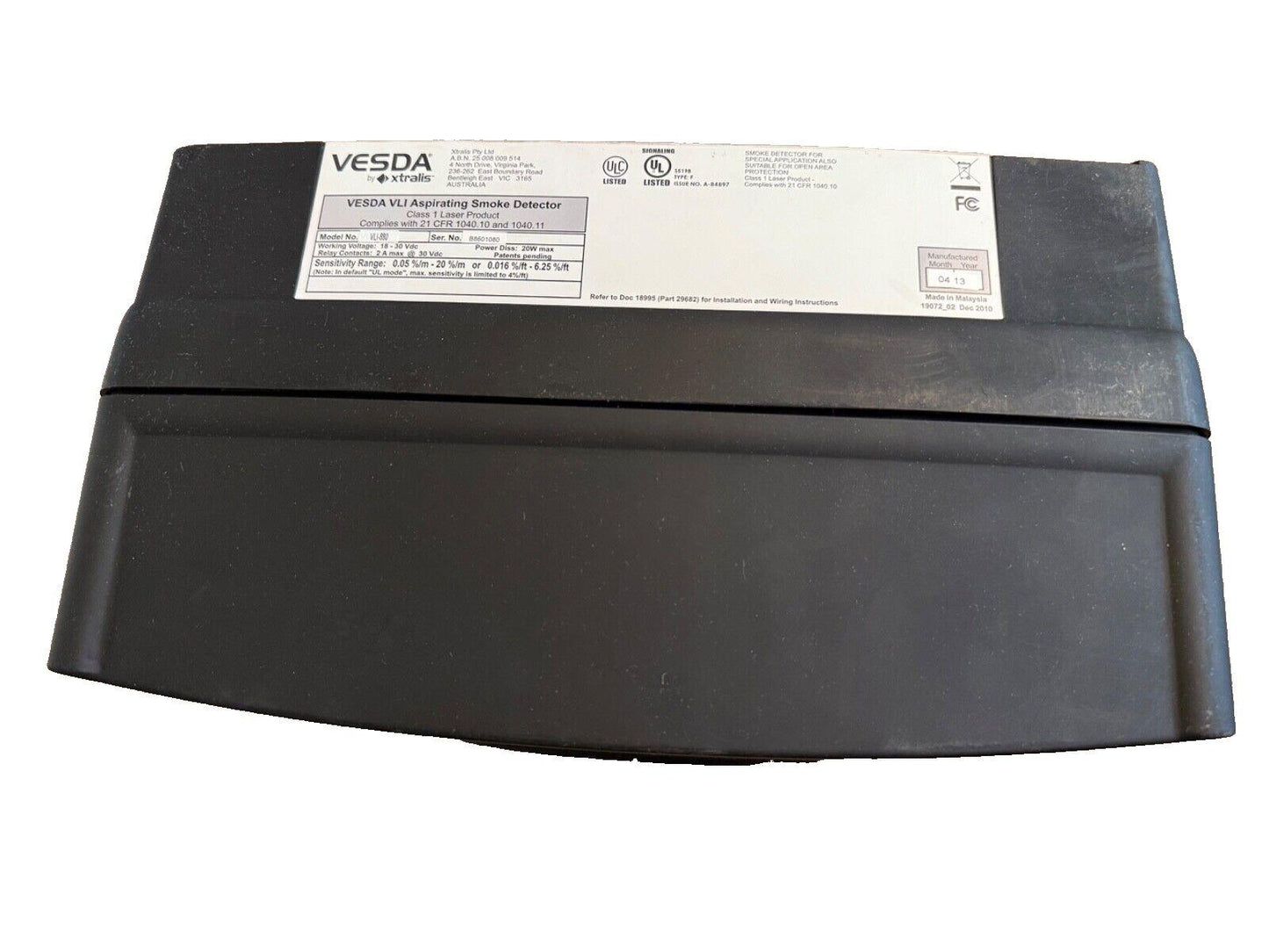 VESDA VLI Aspirating Smoke Detector, Class 1 Laser Product for fire alarm systems, black housing with label details