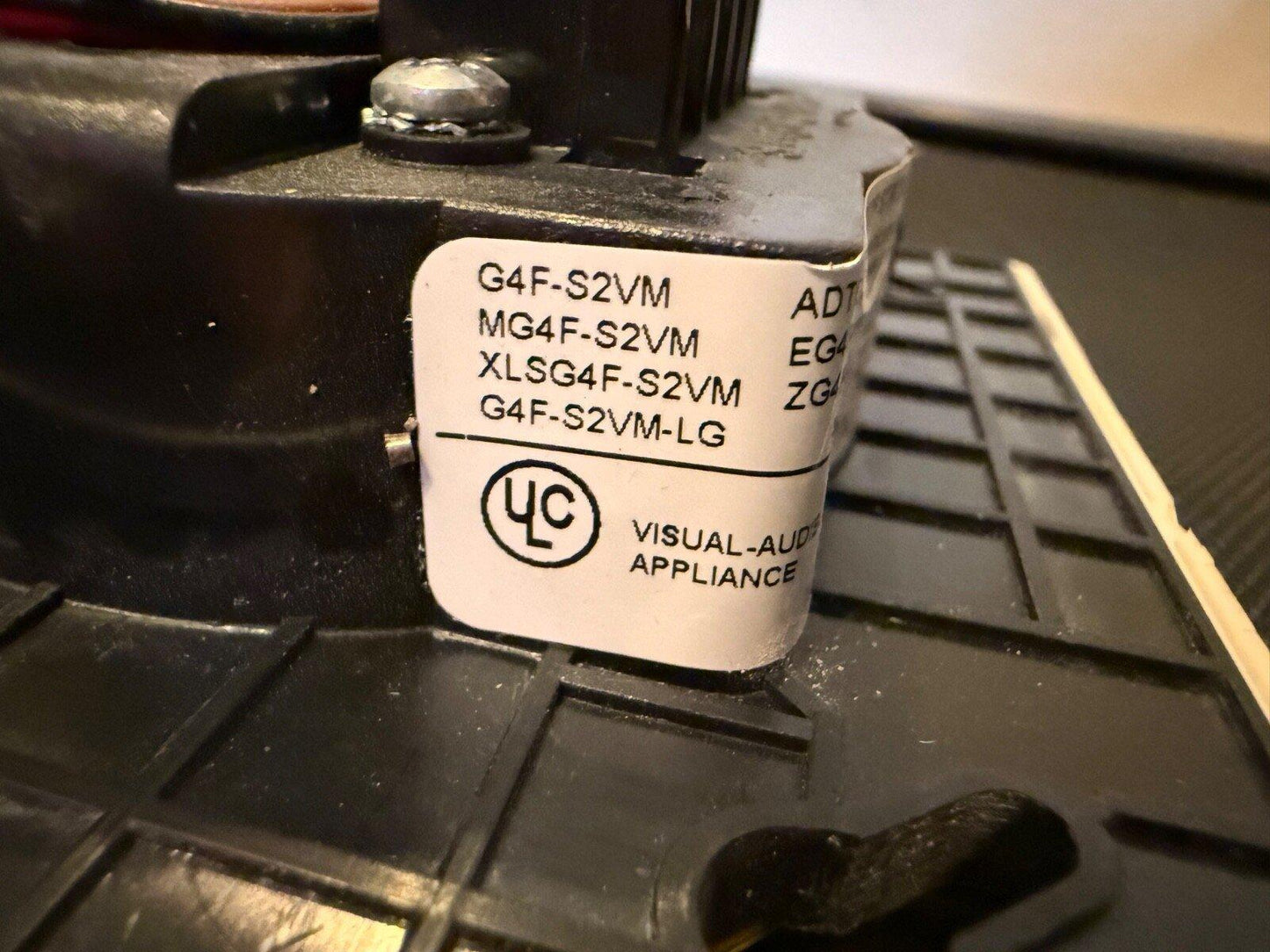 G4F-S2VM fire alarm visual-audible appliance with UL label, black housing, model details visible