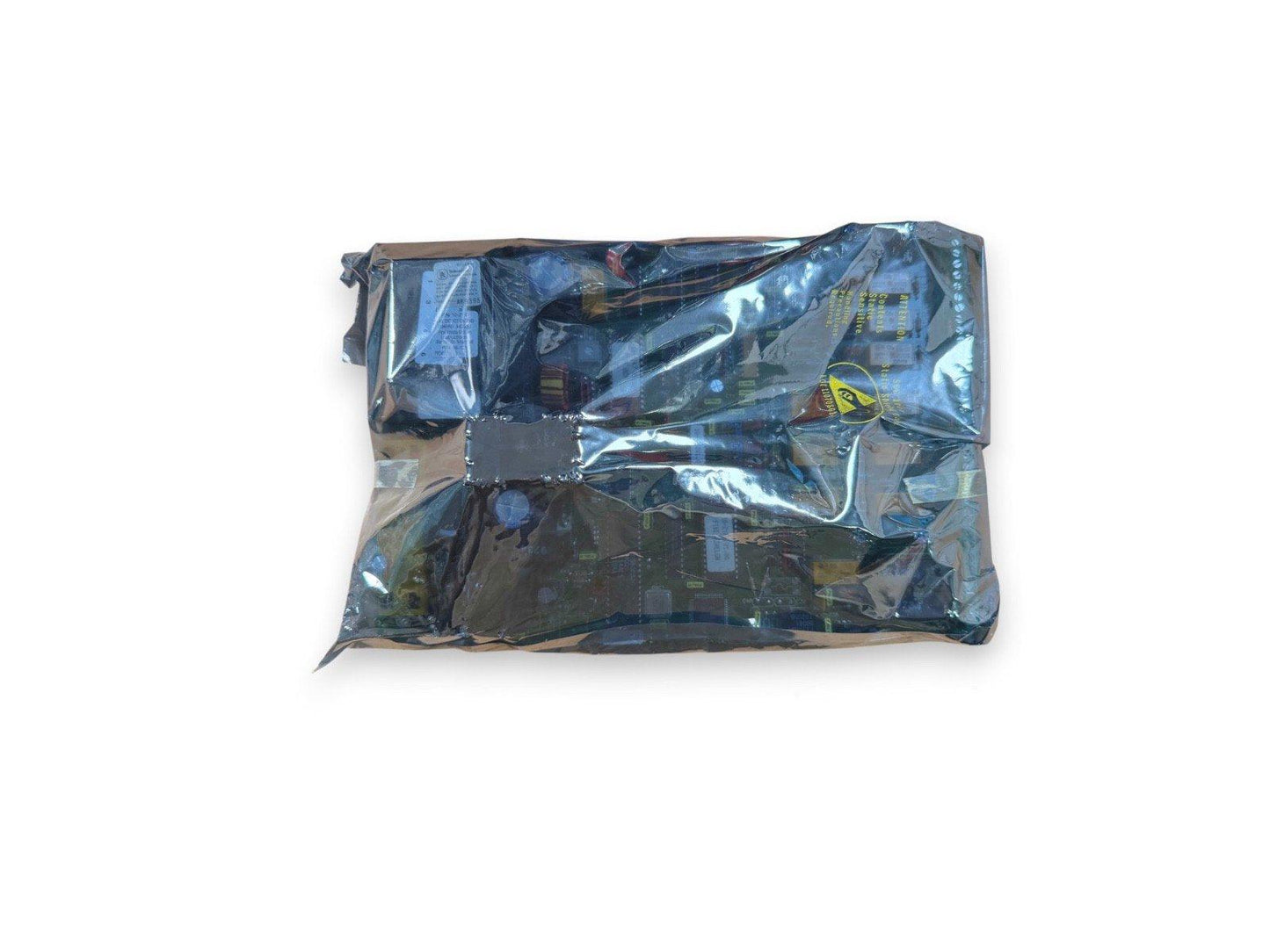 Fire alarm control panel circuit board in anti-static bag, ready for installation or repair