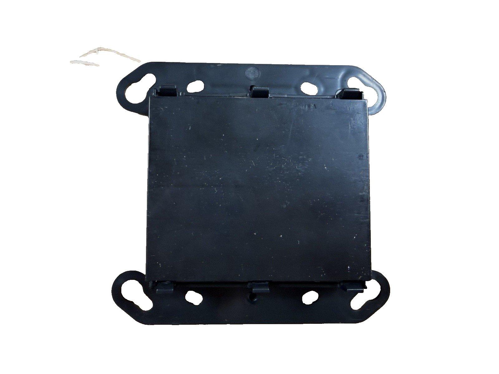 Black fire alarm control panel mounting bracket with installation holes and clips
