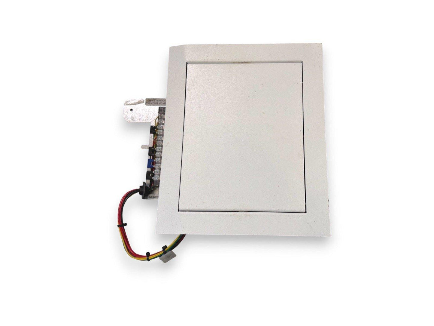 White fire alarm pull station with wiring terminals and colored wires, for commercial safety systems