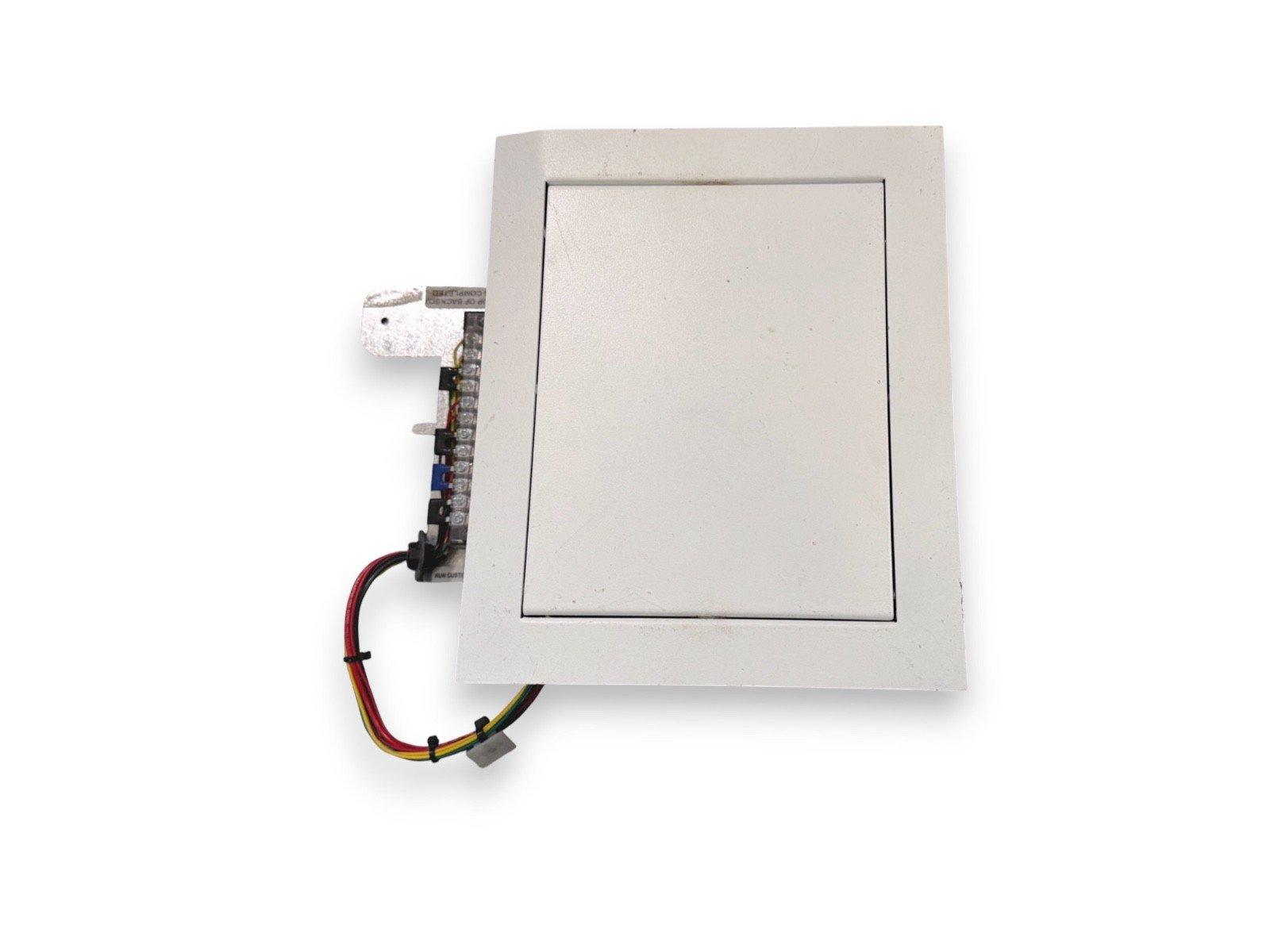 White fire alarm pull station with wiring terminals and colored wires, for commercial safety systems