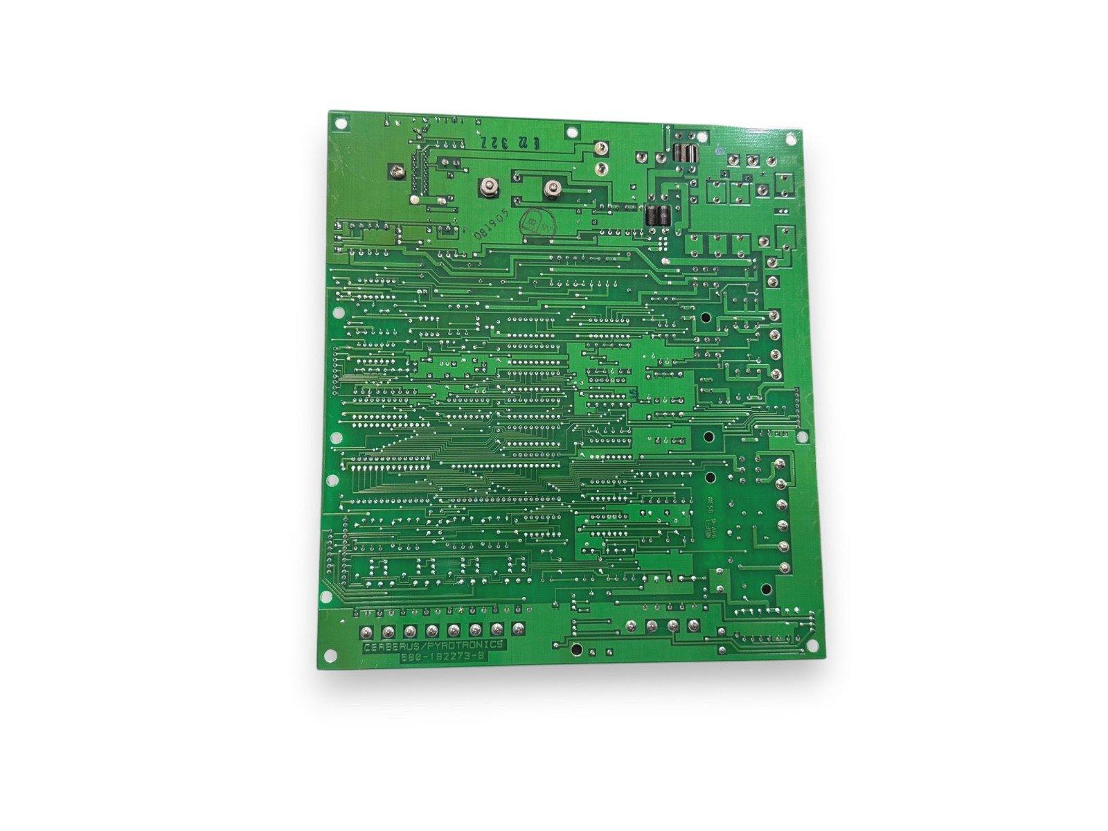 Green fire alarm control panel circuit board with Cerberus Pyrotronics labeling, used in fire safety systems.