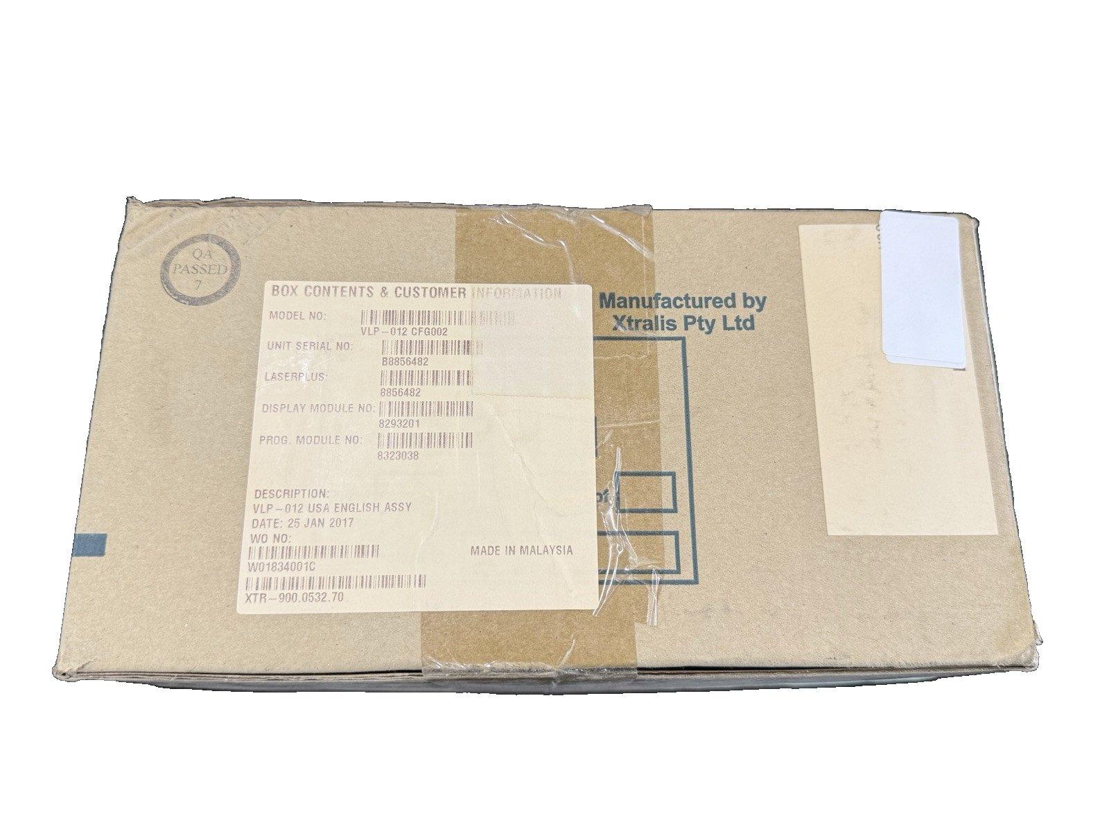 Sealed fire alarm equipment box, VLP-012 model, manufactured by Xtralis, made in Malaysia, with QA passed stamp.
