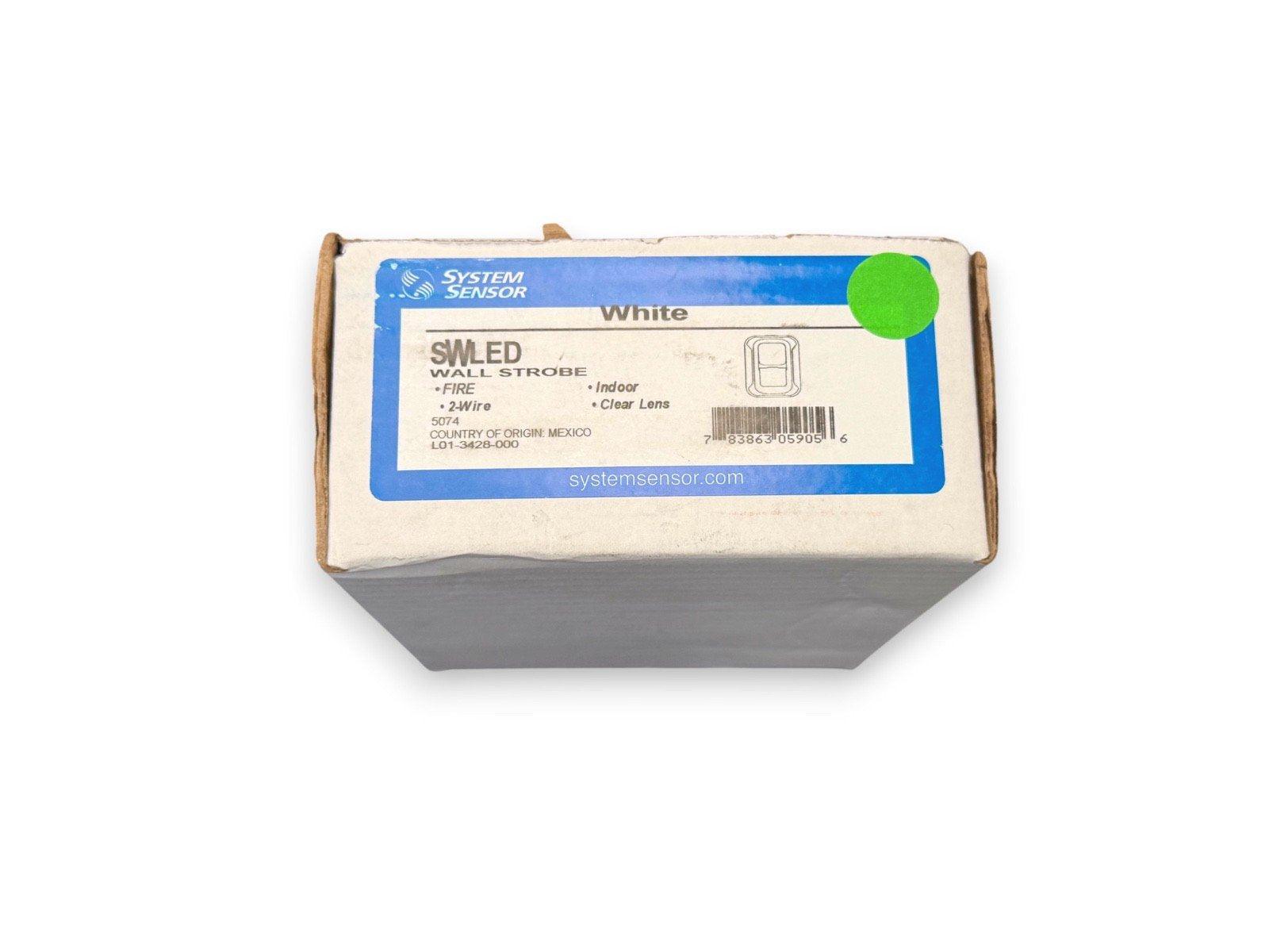 System Sensor SWLED white wall strobe fire alarm, 2-wire indoor device with clear lens, packaged in box