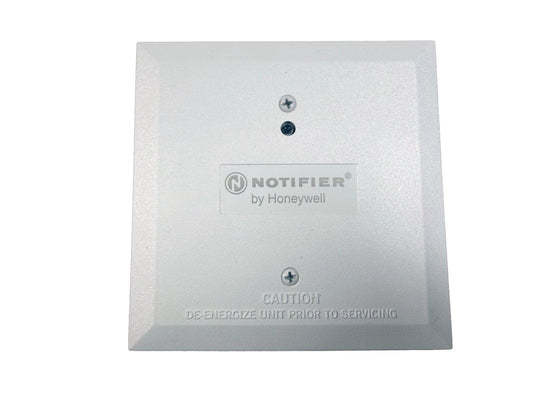 Notifier by Honeywell fire alarm device with caution label, white square panel for fire safety systems