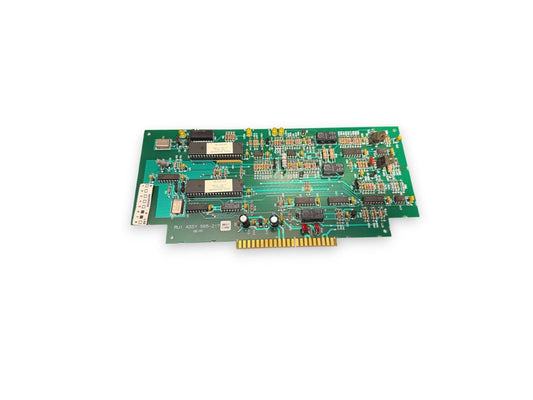 Green fire alarm control panel circuit board with integrated chips and connectors for fire safety systems