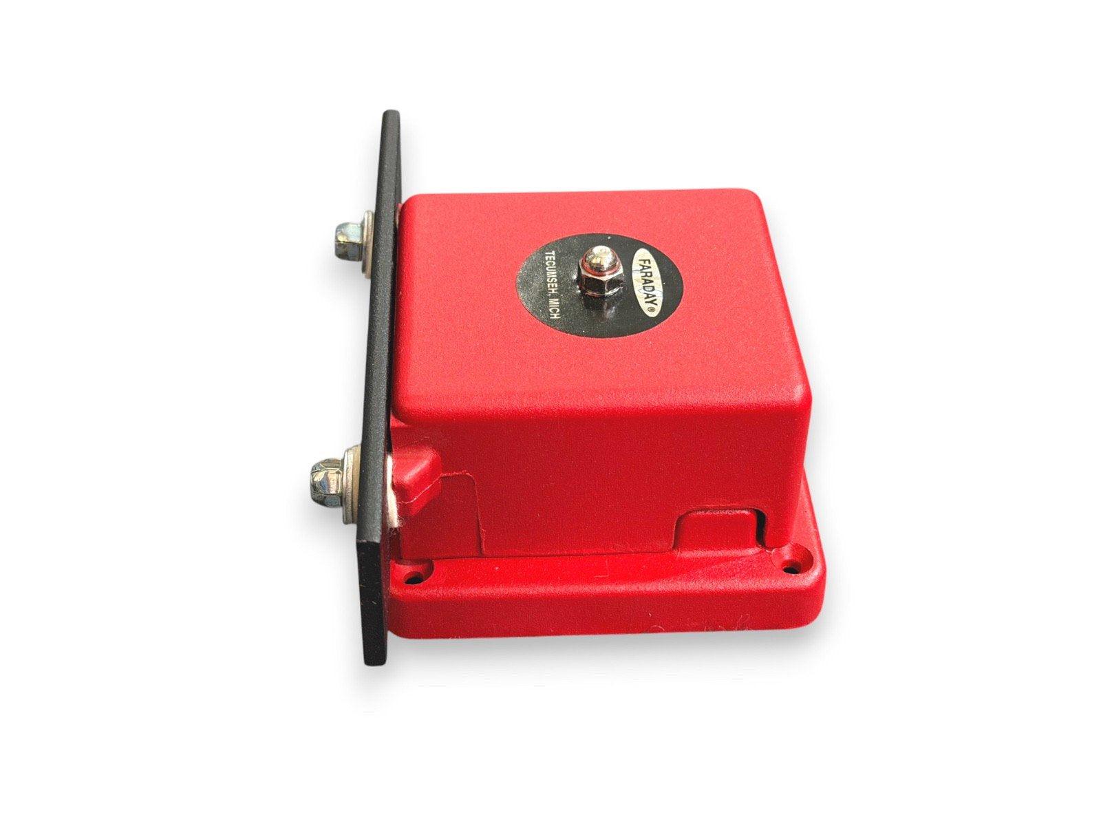 Red Faraday fire alarm pull station with mounting bracket, used in commercial safety systems
